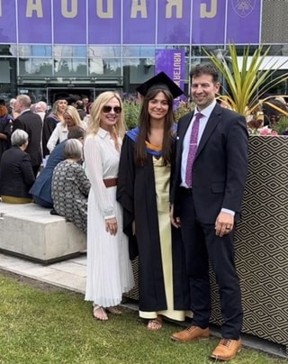 Eve with her family at her graduation