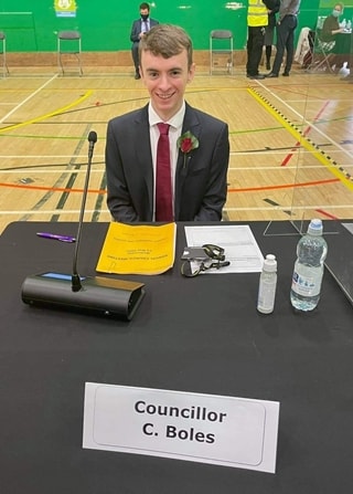 Ciaron Boles sits at Labour Councillor's desk