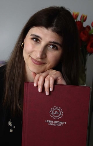Photo of Paulina Solka with a book