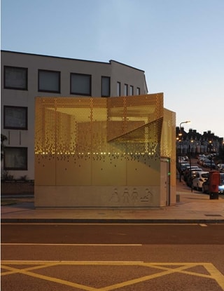 Gold sculpture on a street corner