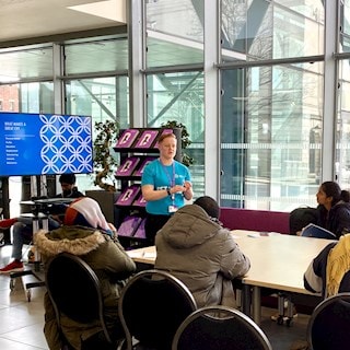 Staff member giving a talk at an employability event