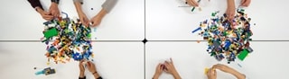 Image of people playing with Lego