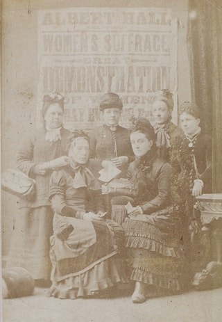 Alice Cliff Scatchered (seated Left) at a meeting of the Manchester Women's Sufferage Branch (image in public domain)
